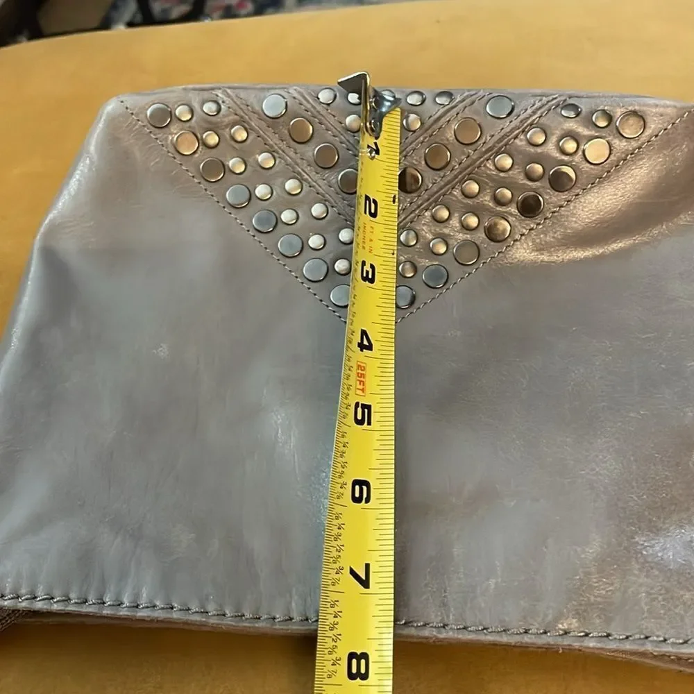 The Sak Indio Grey Leather Studded Hobo Bag With Tassel